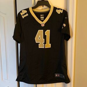 Saints jersey- worn a handful of times.  Excellent condition